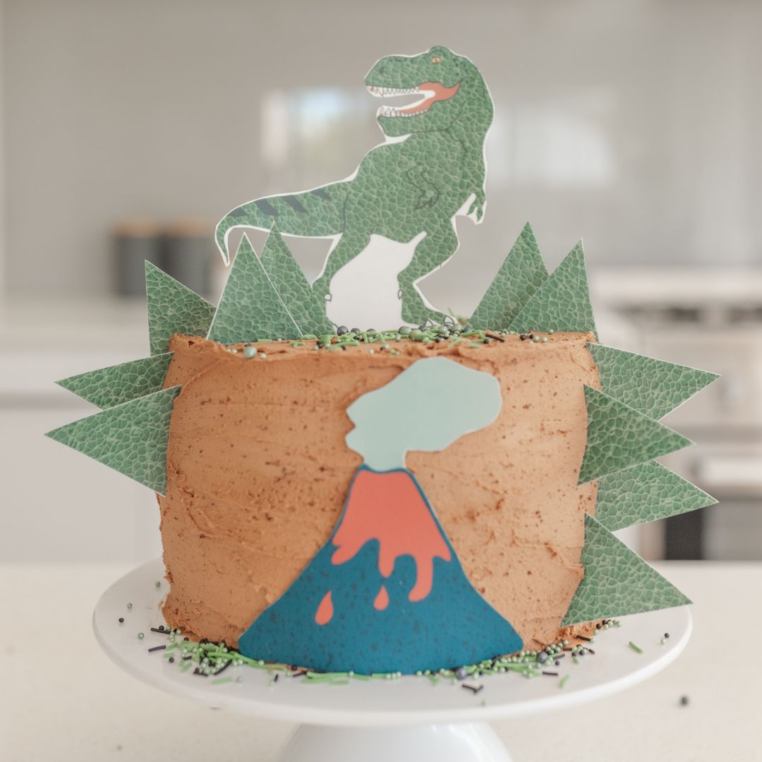 Cute Pastel T-rex With Party Hat Dinosaur Cake